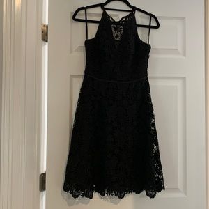 Black lace, A-line dress , back zip. Worn once